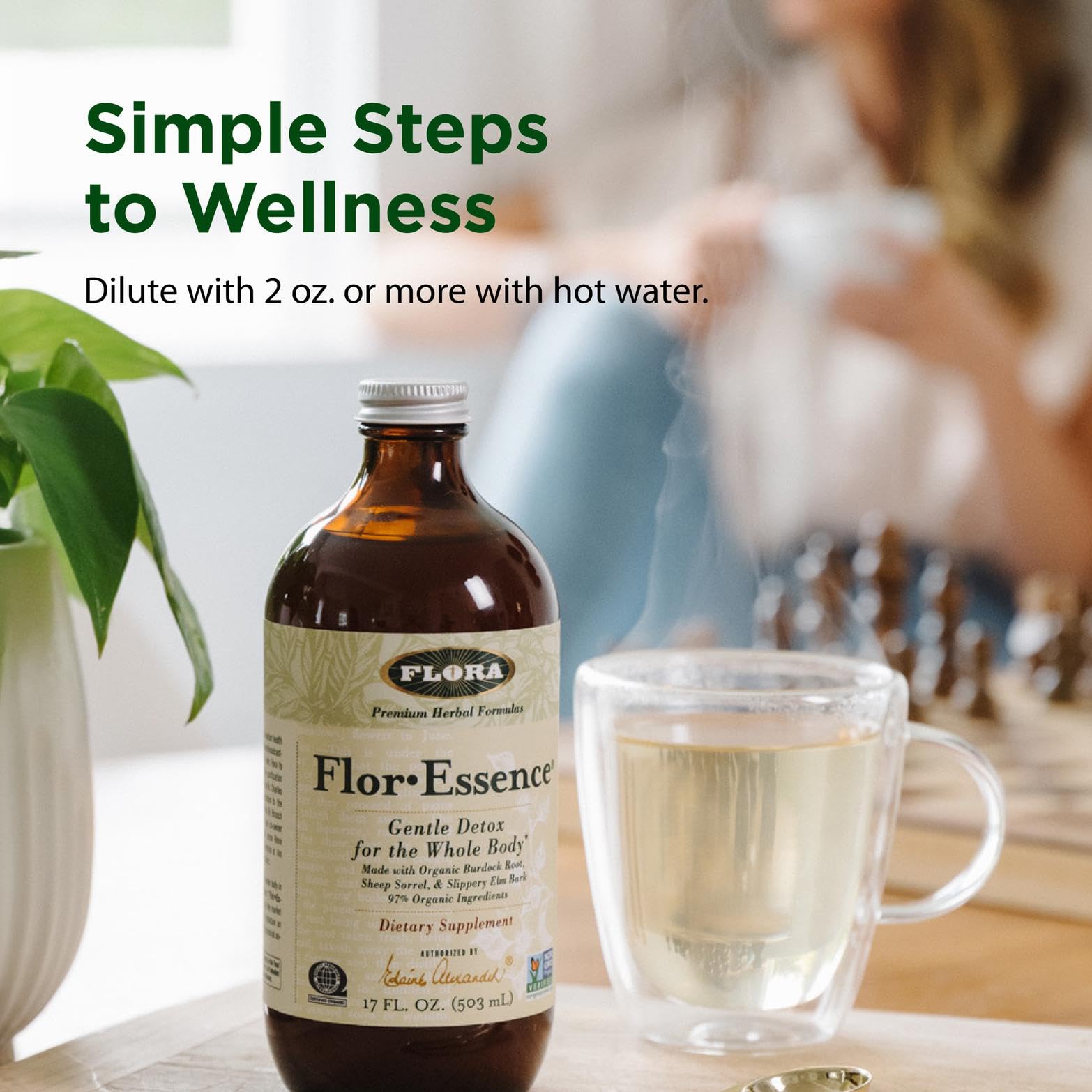 Flora Flor Essence tea in a warm cup with steam for relaxing wellness