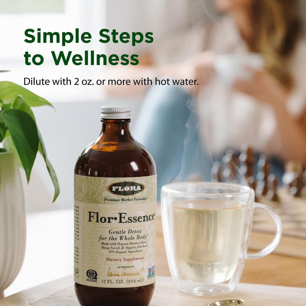 Flora Flor Essence tea in a warm cup with steam for relaxing wellness
