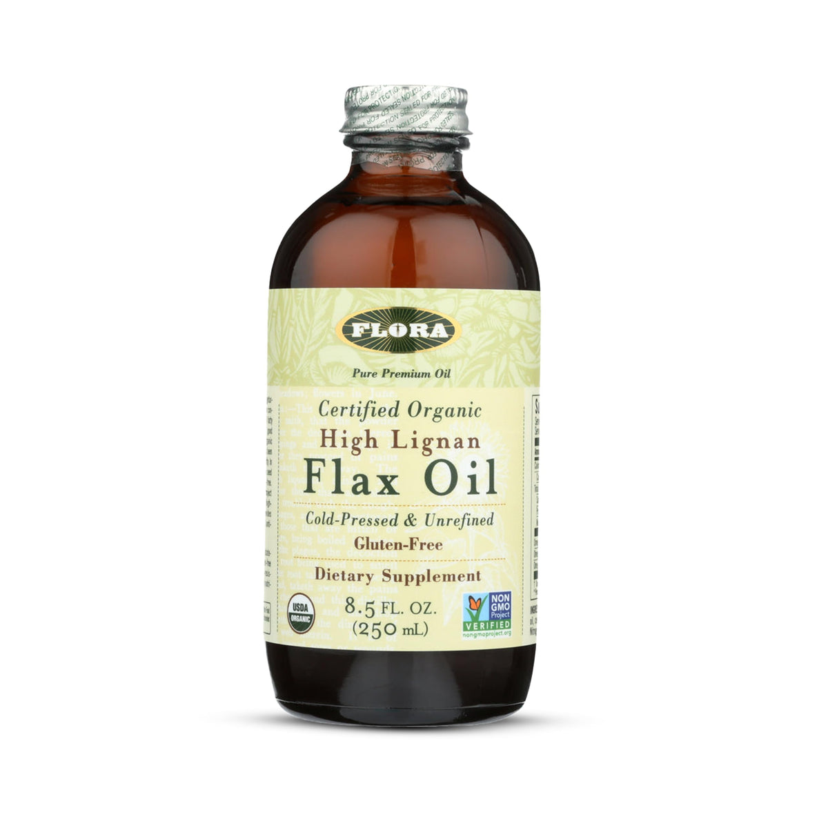 Flora High Lignan Flax Oil bottle on kitchen counter, ideal for adding EFAs to salads.