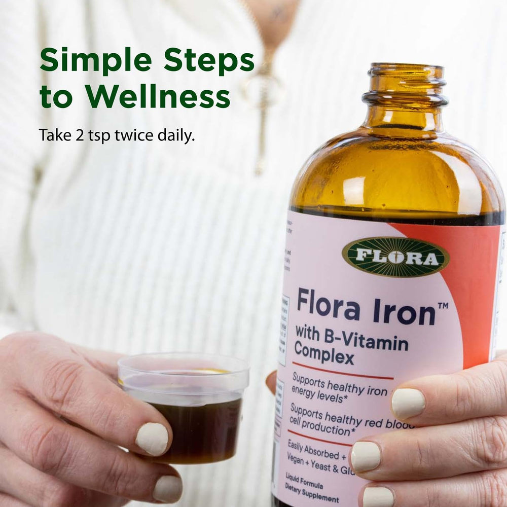 Glass bottle presentation emphasizes premium Flora packaging