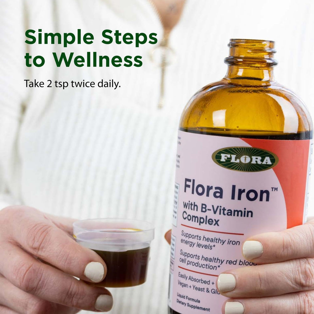 Flora Iron glass bottle hero shot emphasizing purity and packaging