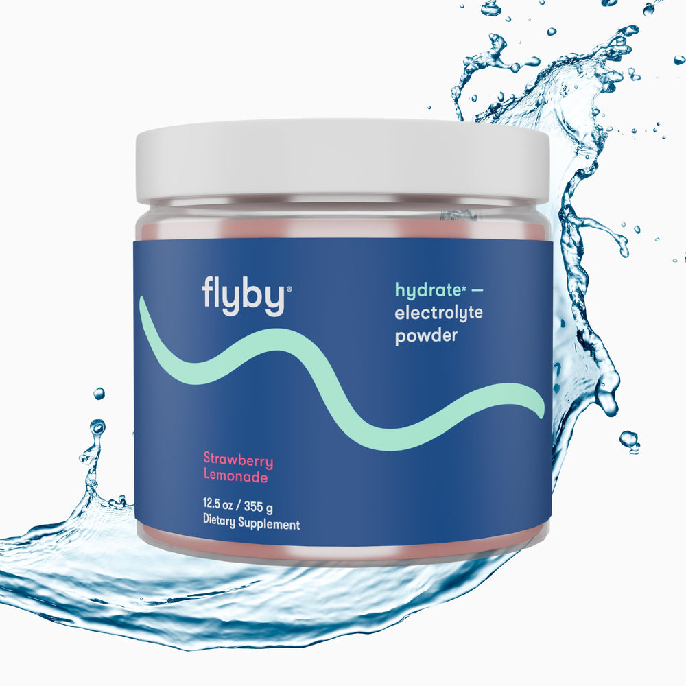 Flyby Electrolytes Strawberry Lemonade scoop for precise dosing.
