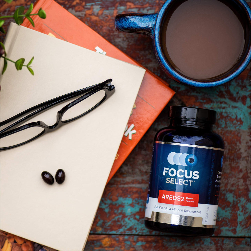 Focus Select AREDS2 bottle pouring capsules into hand for easy intake.