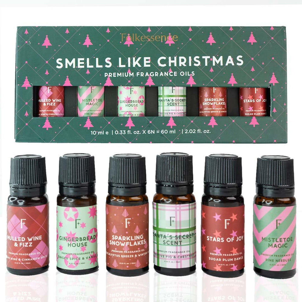 Folkulture Christmas essential oils set in diffuser bottles for a festive home scent.
