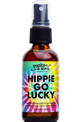 Frankie and Myrrh Hippie Go Lucky bottle pour highlights the earthy-citrus blend for mood uplift