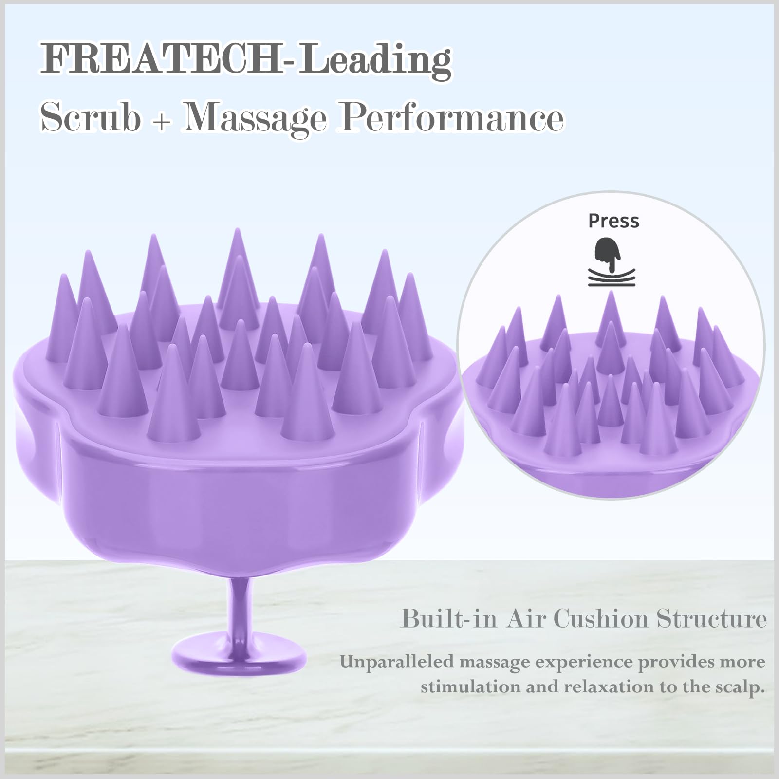 FREATECH massager used on dry hair for scalp stimulation.