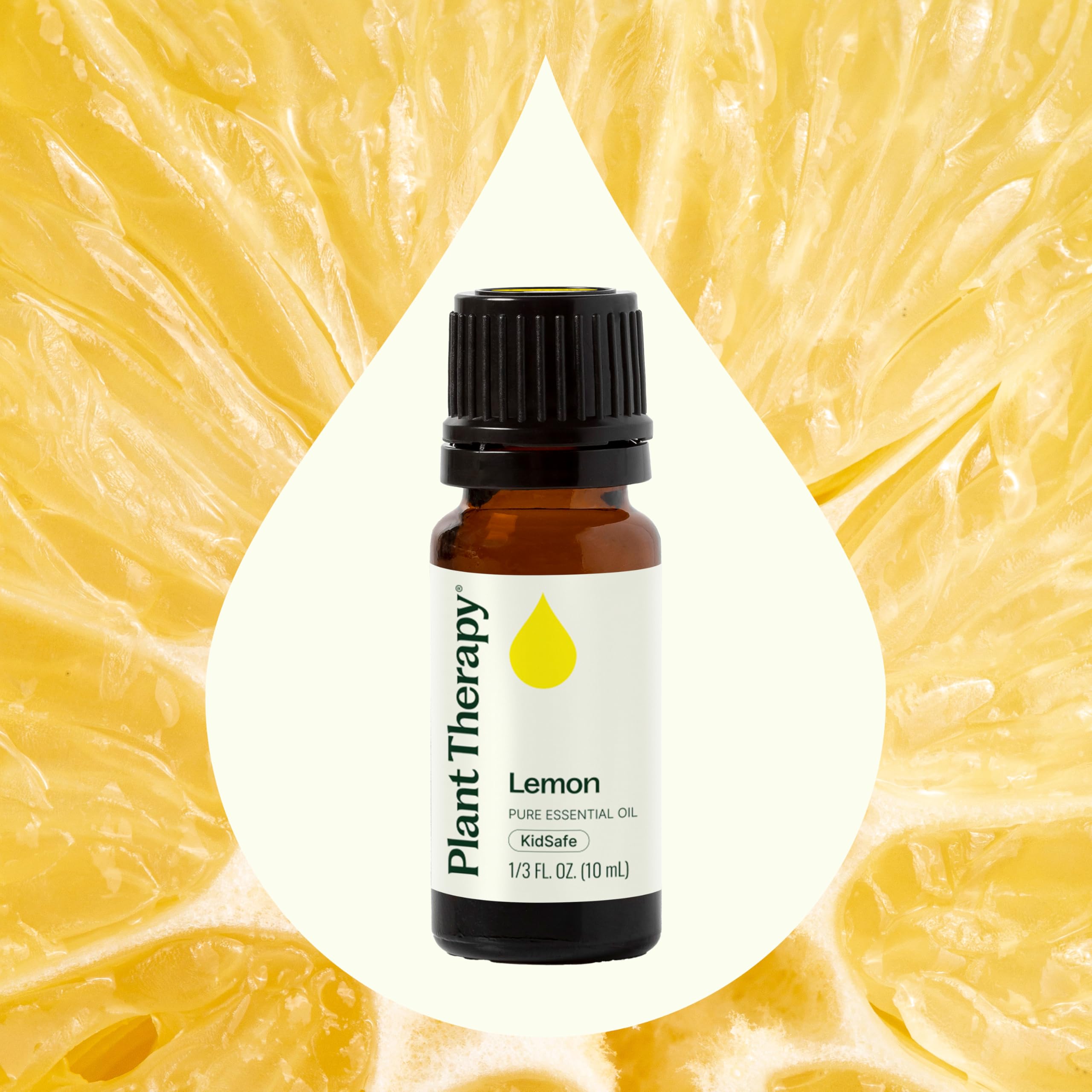 Fresh lemon slices sit beside the bottle to suggest scent and cleaning potential.