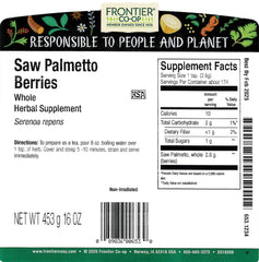 Frontier Co-op saw palmetto berries close-up, dark purple to black fruit.
