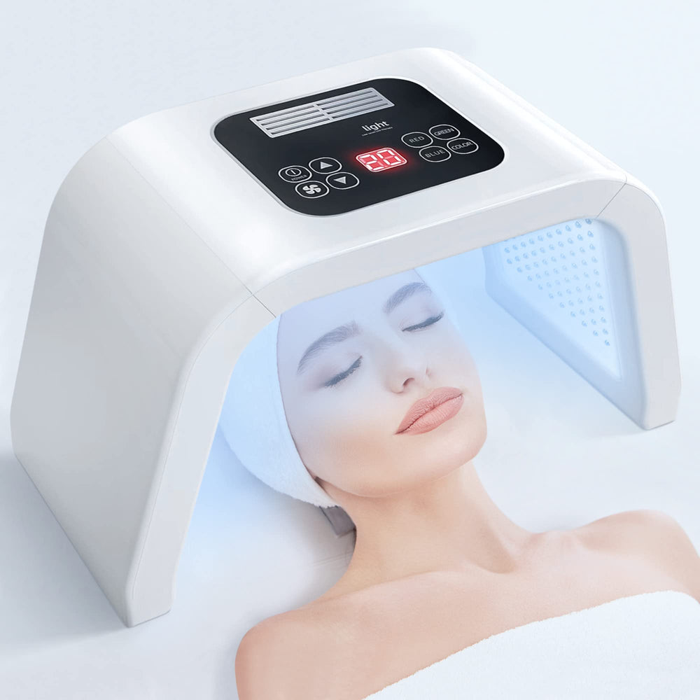 FXXXCUWUU LED light therapy on the face for at-home skincare.