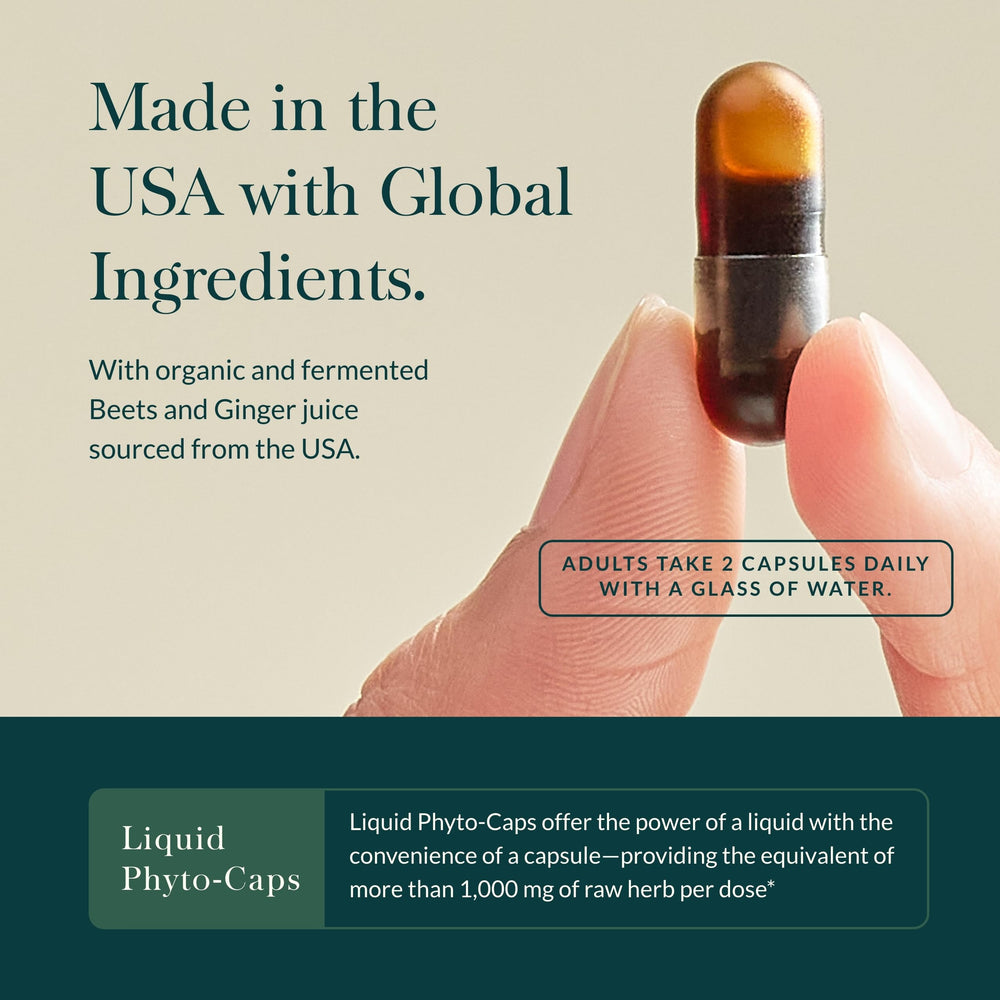 Gaia Herbs Ginger-Beet Postbiotic capsules closeup ready for daily use.
