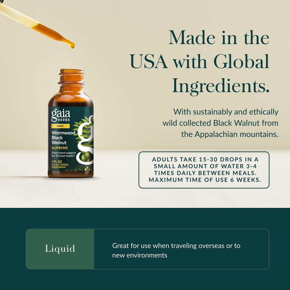 Pouring Gaia Herbs Wormwood Black Walnut Supreme extract demonstrates convenient dosage for digestive support.