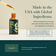 Pouring Gaia Herbs Wormwood Black Walnut Supreme extract demonstrates convenient dosage for digestive support.