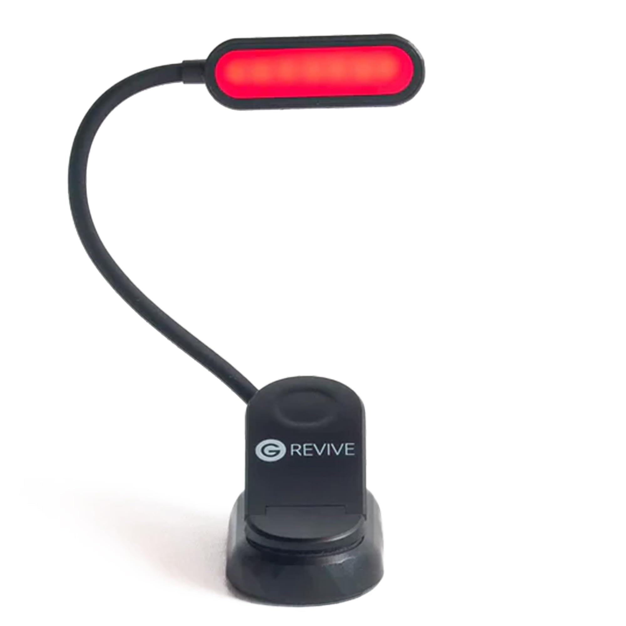 Gamma Revive 670nm red reading light on bed for low-blue-light reading.