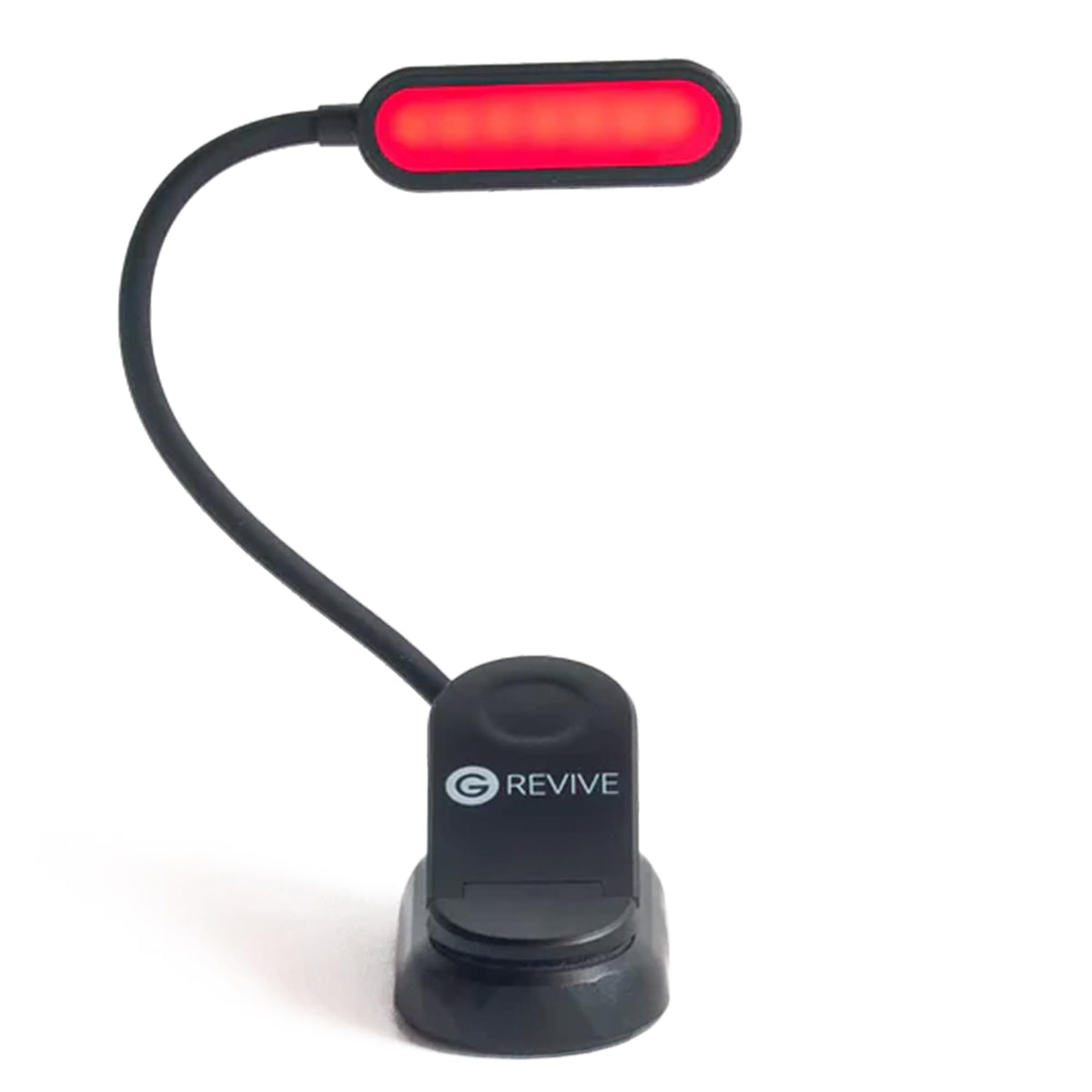 Gamma Revive 670nm red reading light on bed for low-blue-light reading.