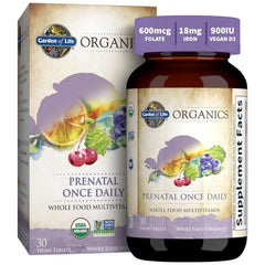 Garden of Life Organics Prenatal tablet close-up, easy-to-swallow formula.