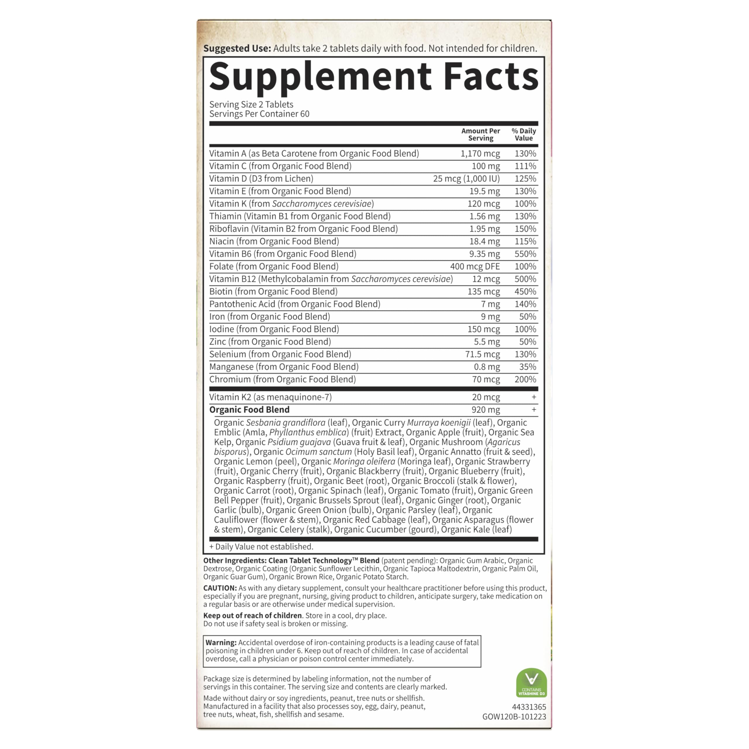 Garden of Life Organics Women's Multi bottle on kitchen counter—daily wellness routine