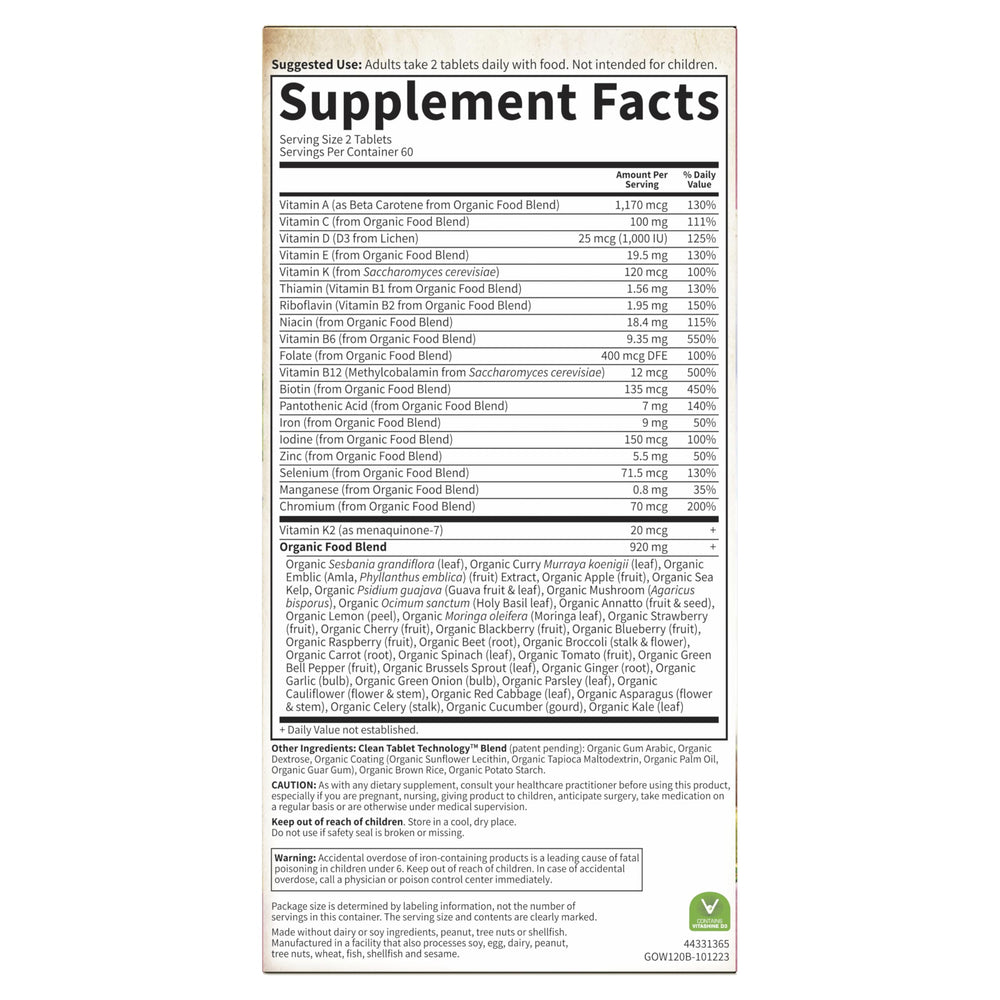 Garden of Life Organics Women's Multi bottle on kitchen counter—daily wellness routine