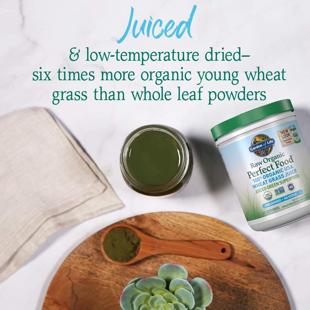 Powder poured into a glass for a quick Garden of Life greens boost.