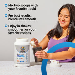 Garden of Life vanilla protein scoop beside powder canister for convenient measuring.
