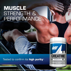 GAT SPORT Creatine Monohydrate scoop measuring a 5 g serving for workouts.