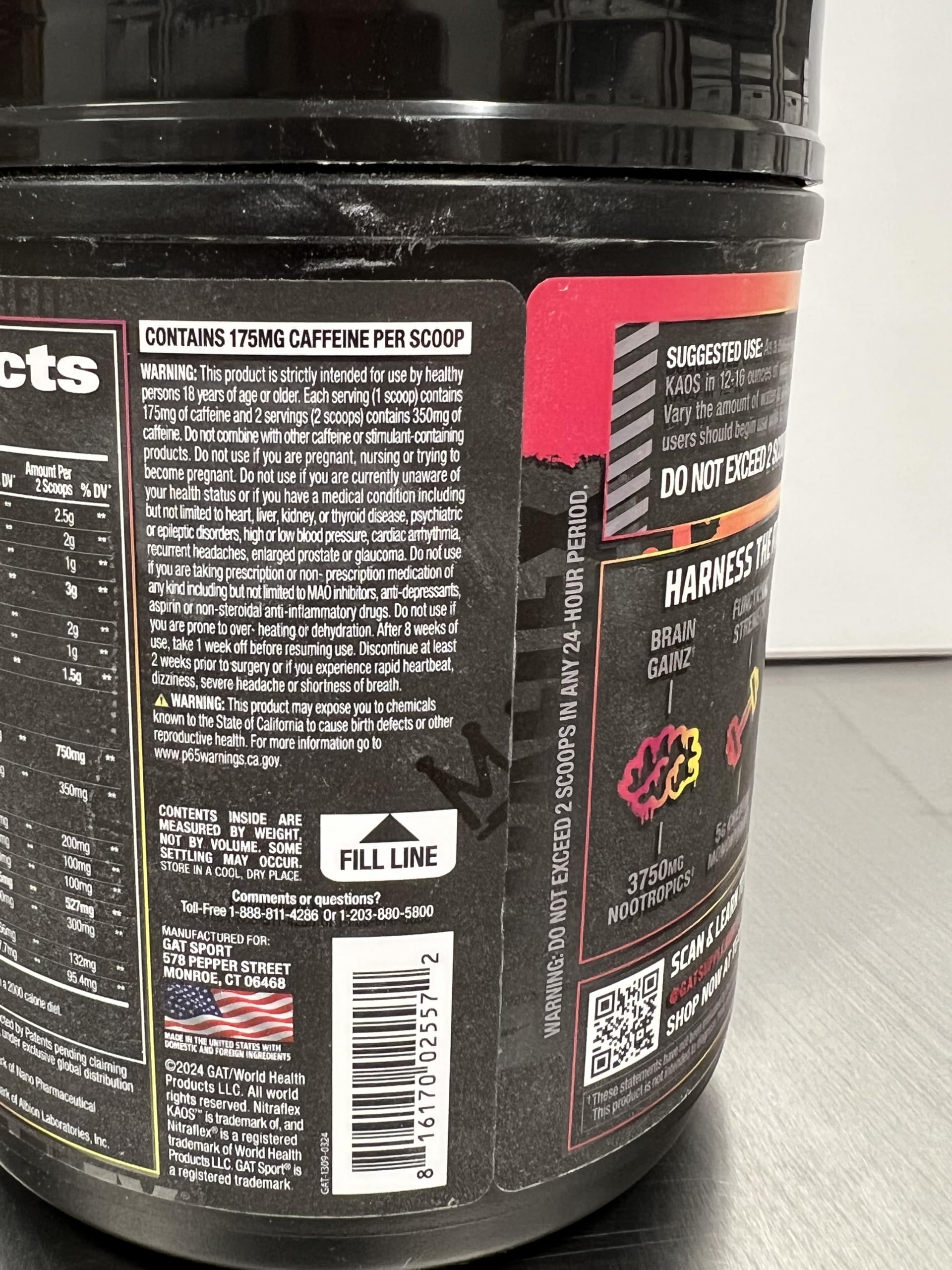 GAT SPORT Nitraflex KAOS Berry Lemonade pouring suggests quick mixing for training days