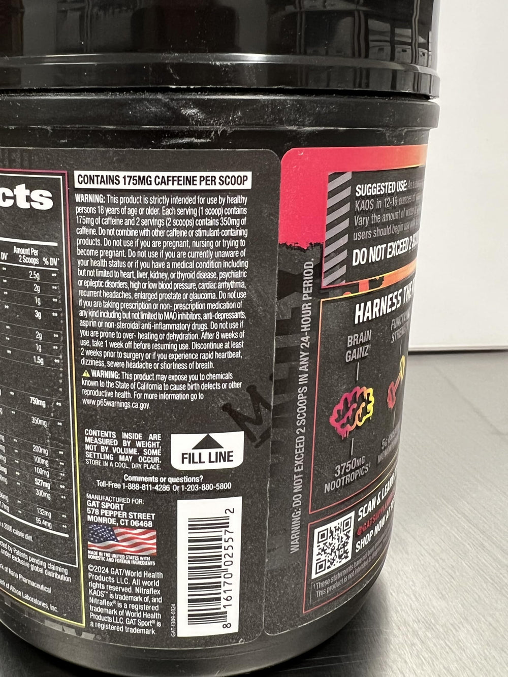 GAT SPORT Nitraflex KAOS Berry Lemonade pouring suggests quick mixing for training days