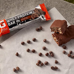 Serving of Gatorade Whey Protein Recover Bar chocolate chip on desk, satisfying taste and energy