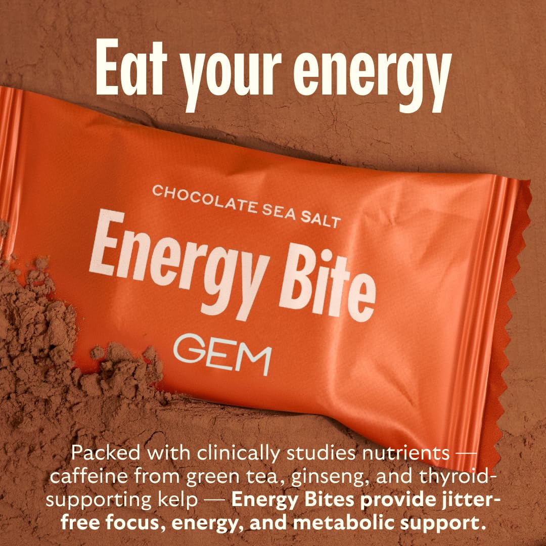 Stacked GEM Energy bites on a clean tabletop display.