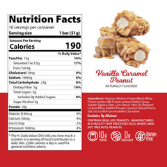 Genius Gourmet Nut Roll Bars bar slice reveals creamy nougat and peanuts for a satisfying texture.