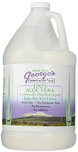 Pouring George's Aloe into a glass for a neutral-tasting beverage