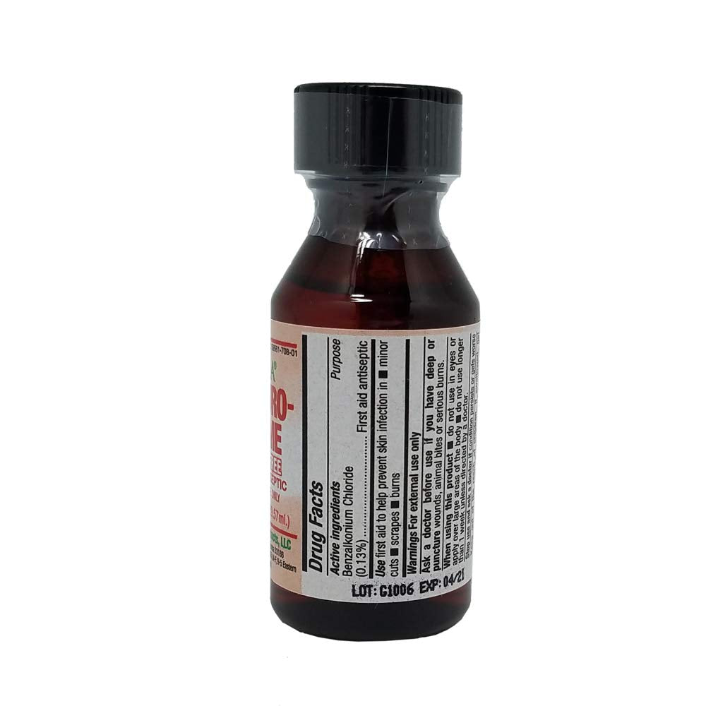 Pouring Germa antiseptic liquid from a small 1 oz bottle for quick wound care