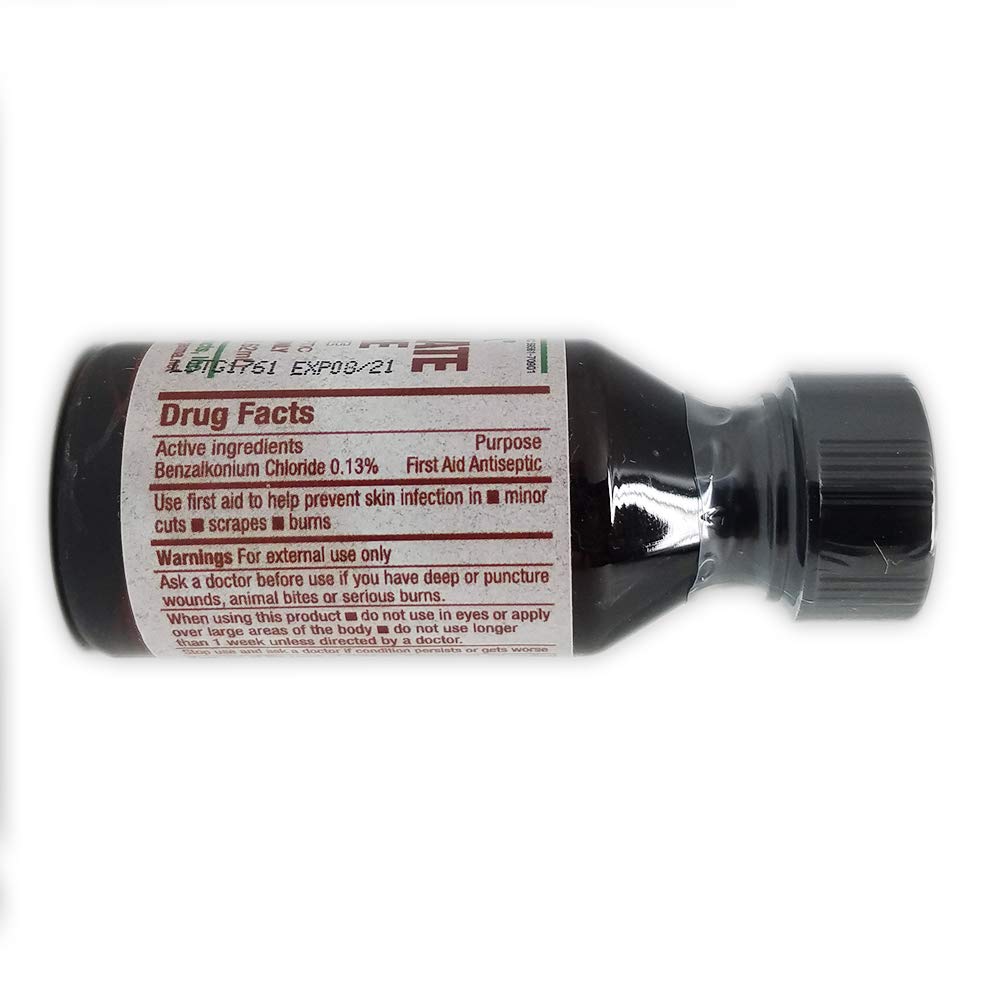 Germa Merthiolate Tincture being applied with a cotton swab for minor wound care