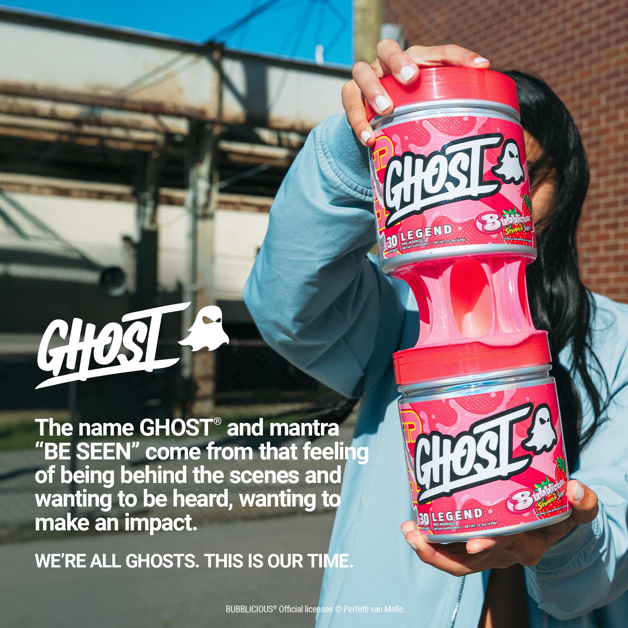 Glass of water and GHOST Legend Strawberry Splash served for a refreshing pre-workout ritual.