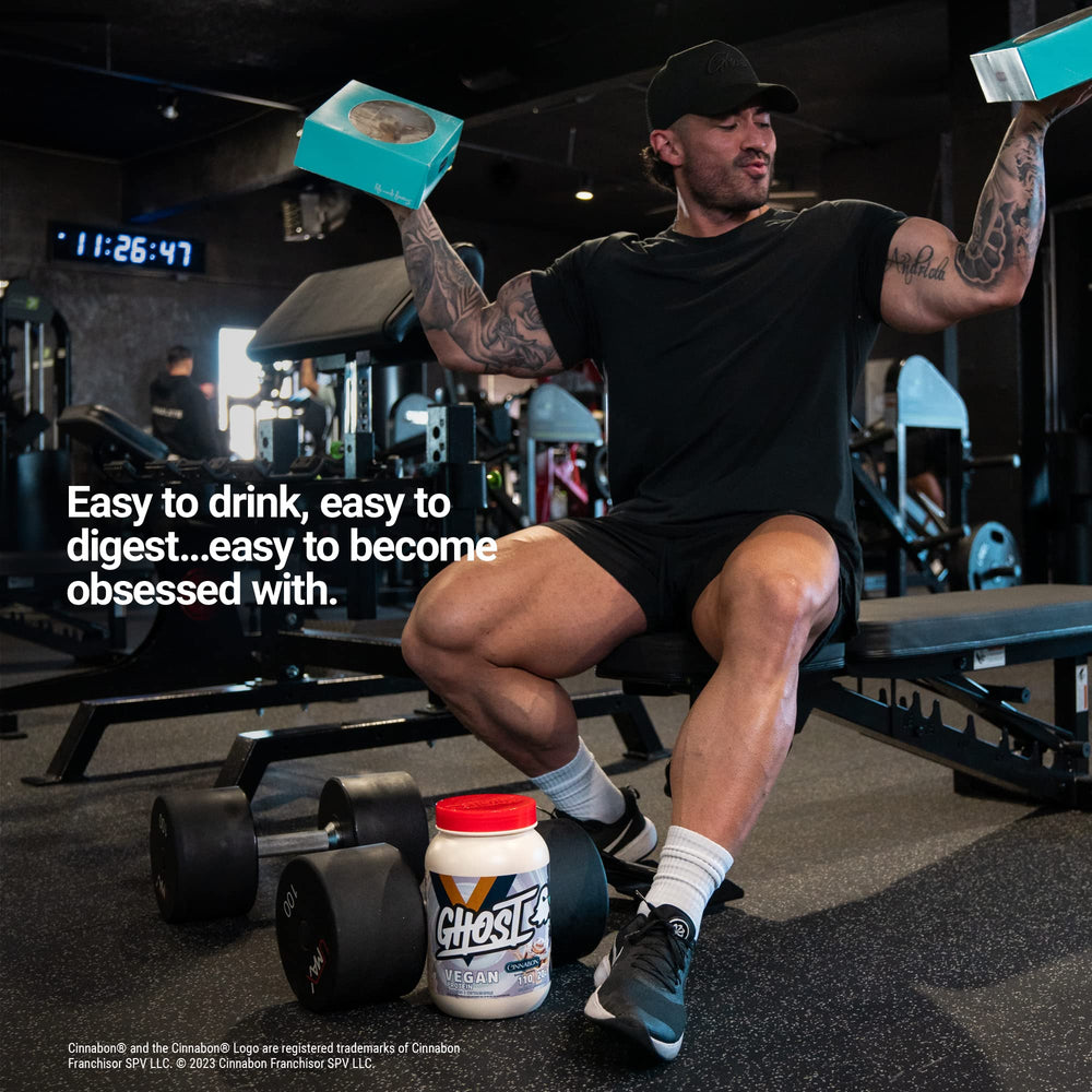 GHOST Vegan Cinabon shake in glass shows creamy texture ideal for post-workout snacks.
