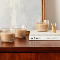 Glade Cashmere Woods blends sandalwood and musk for warm, comforting ambiance.