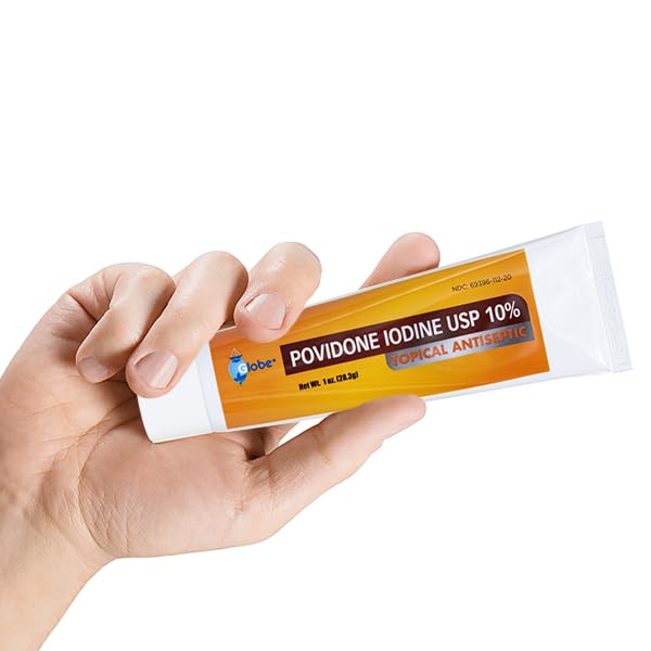 Globe Povidone Iodine 10% ointment golden-brown coverage on skin.