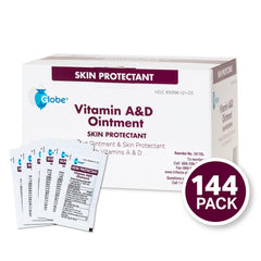 Hands applying Globe Vitamin A&D Ointment for dry skin relief