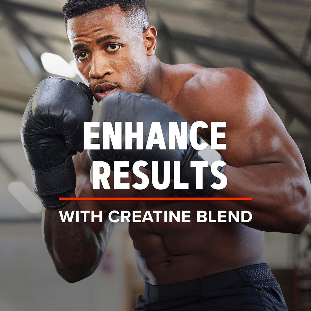 GNC AMP Mass XXX powder being poured into a glass for quick shakes