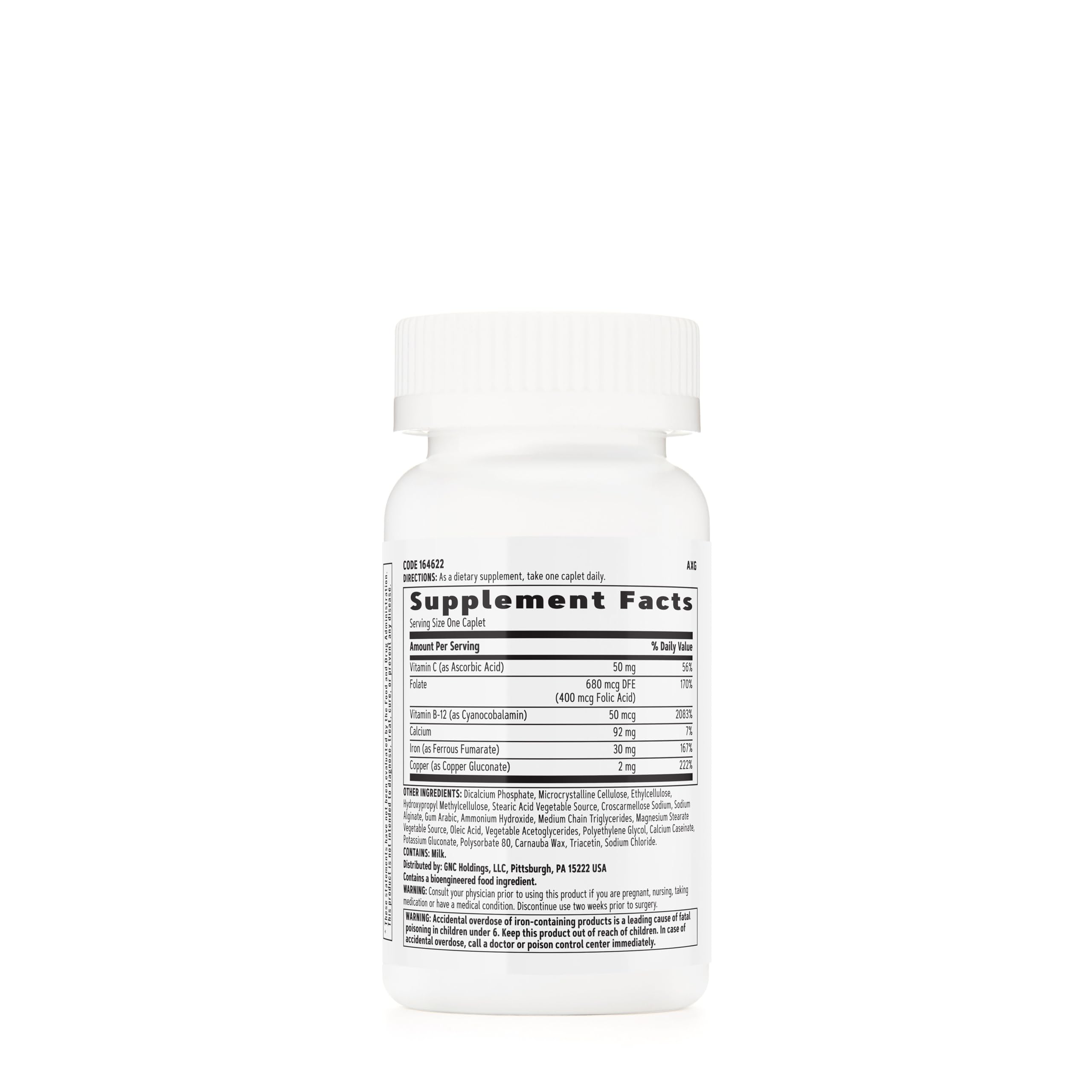 GNC Women's Iron Complete caplets closeup showing enteric coating for gentle digestion.