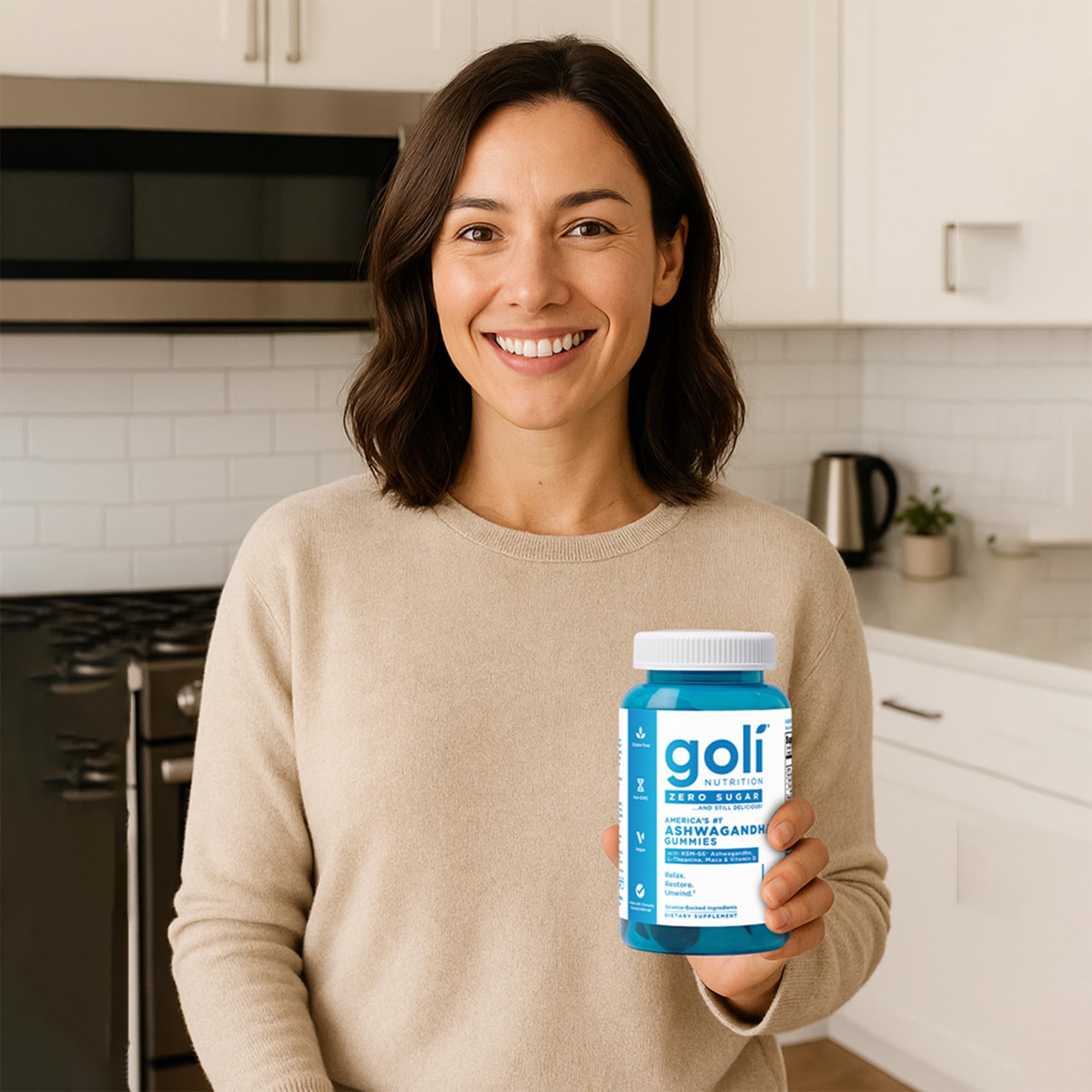 Goli bottle with a glass of water for easy daily intake