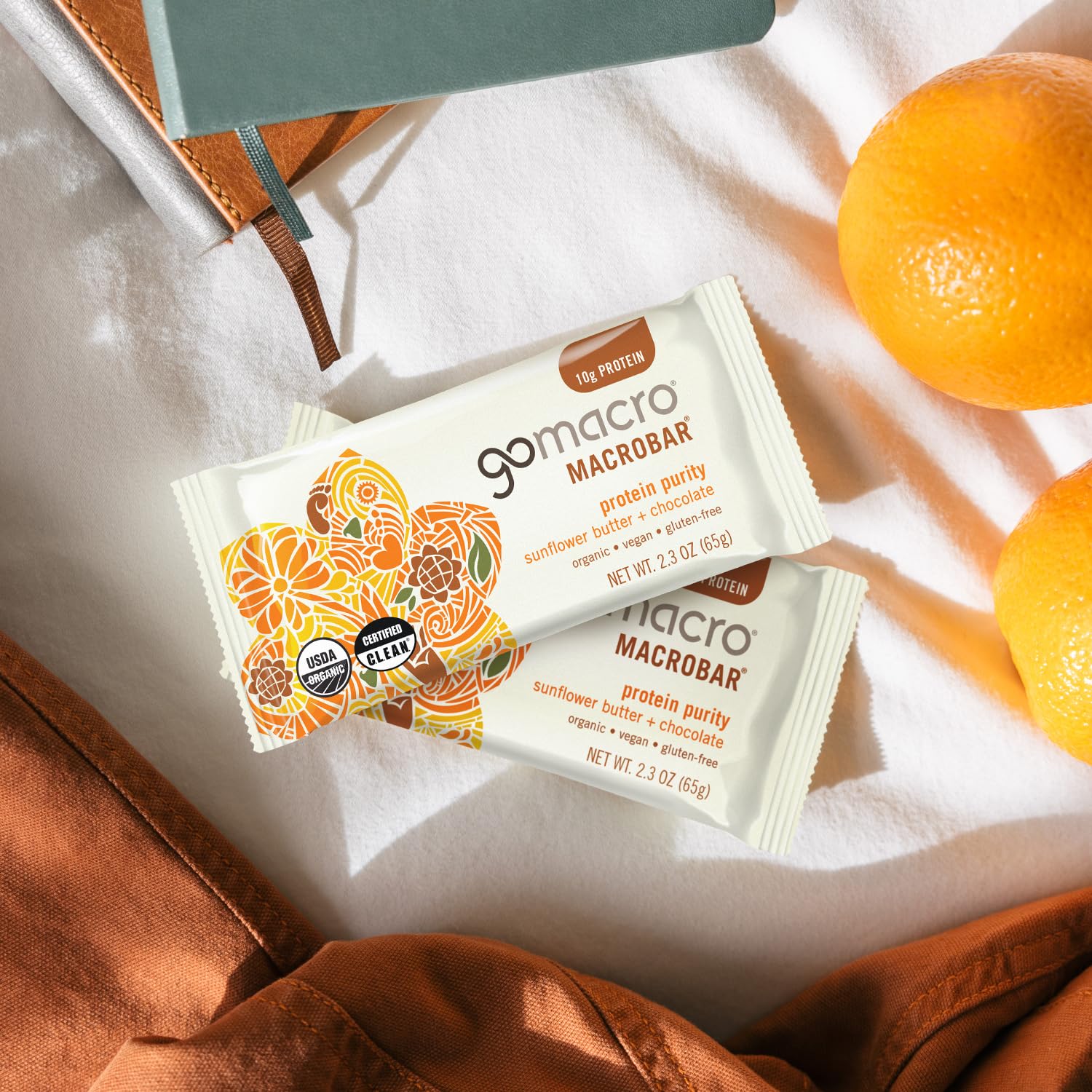Close-up of GoMacro MacroBar ingredients: sunflower butter, cocoa, puffed rice.