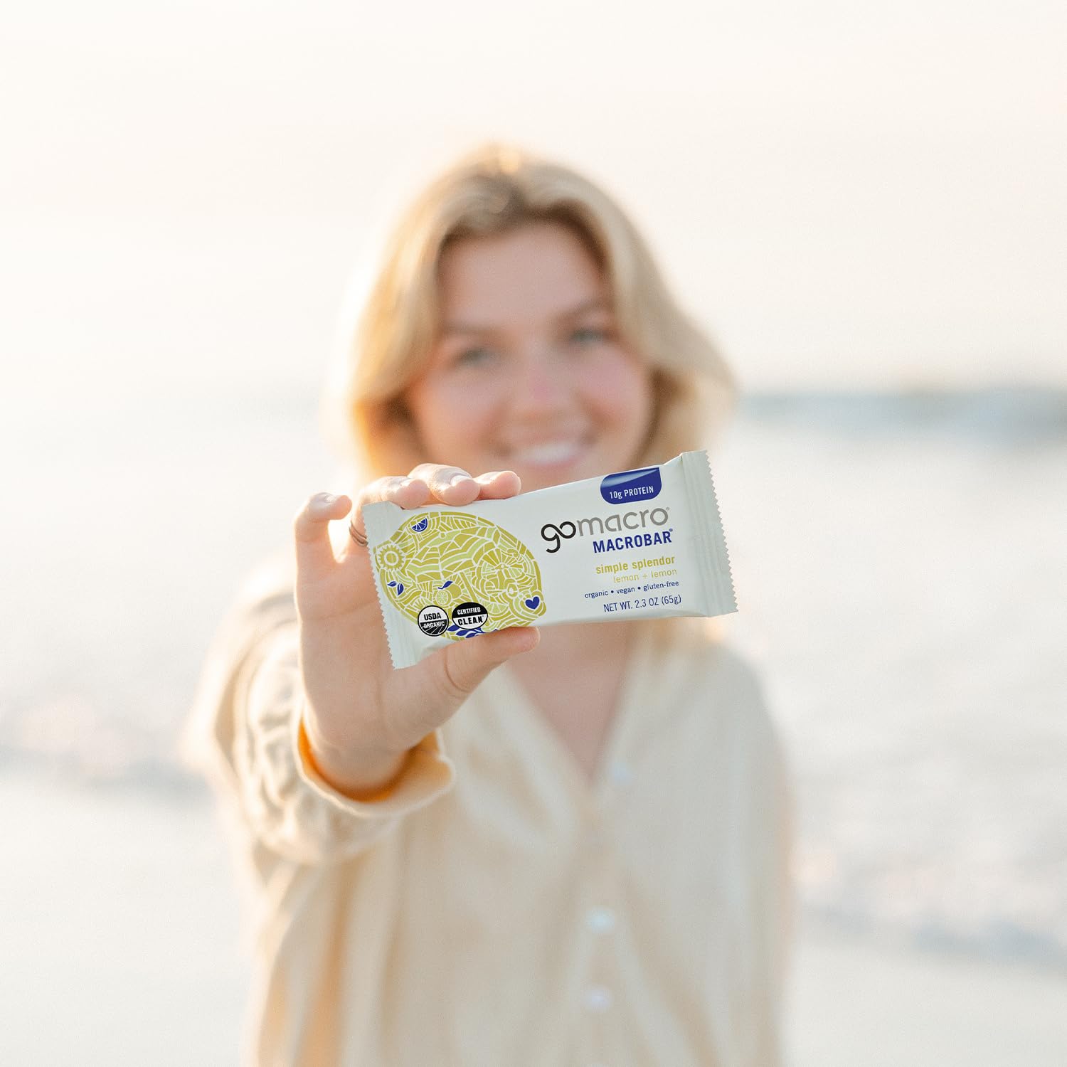 GoMacro MacroBar Lemon + Lemon shown as an on-the-go vegan snack for busy days.