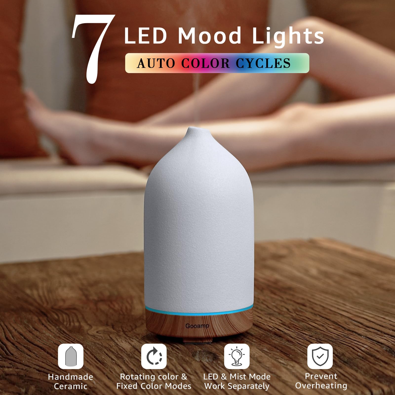 Close-up of Gooamp ceramic diffuser showing wood grain base and craftsmanship