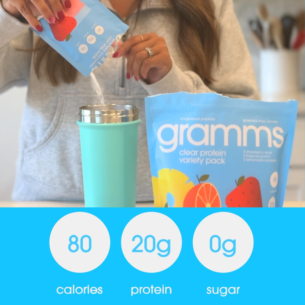 GRAMMS Clear Protein Water packaging; grass-fed whey isolate branding visible.