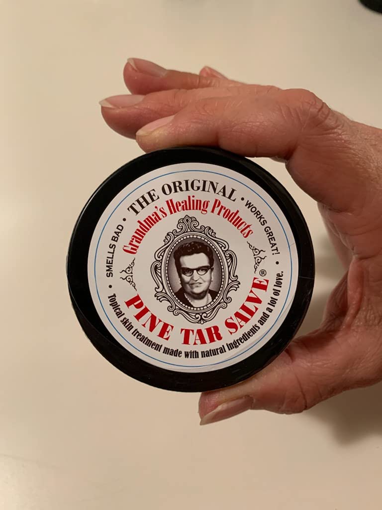 Grandma's Pine Tar Salve application scene with a clean Q-tip.