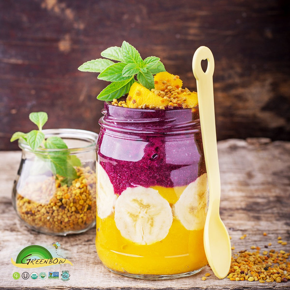 Greenbow Organic Bee Pollen on a spoon with yogurt for quick supplement.