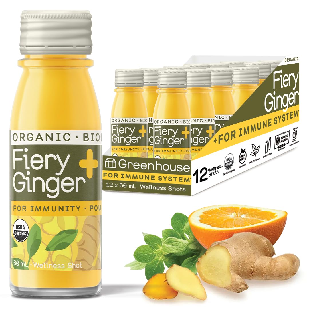 GREENHOUSE JUICE CO fiery ginger turmeric shot bottle close-up for immune support.