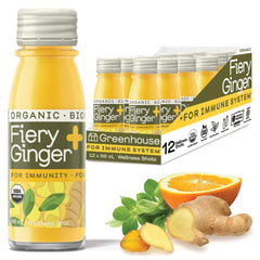 GREENHOUSE JUICE CO fiery ginger turmeric shot bottle close-up for immune support.