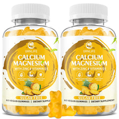 GrnLife calcium magnesium zinc gummies bottle promoting bone and muscle support with pineapple flavor.