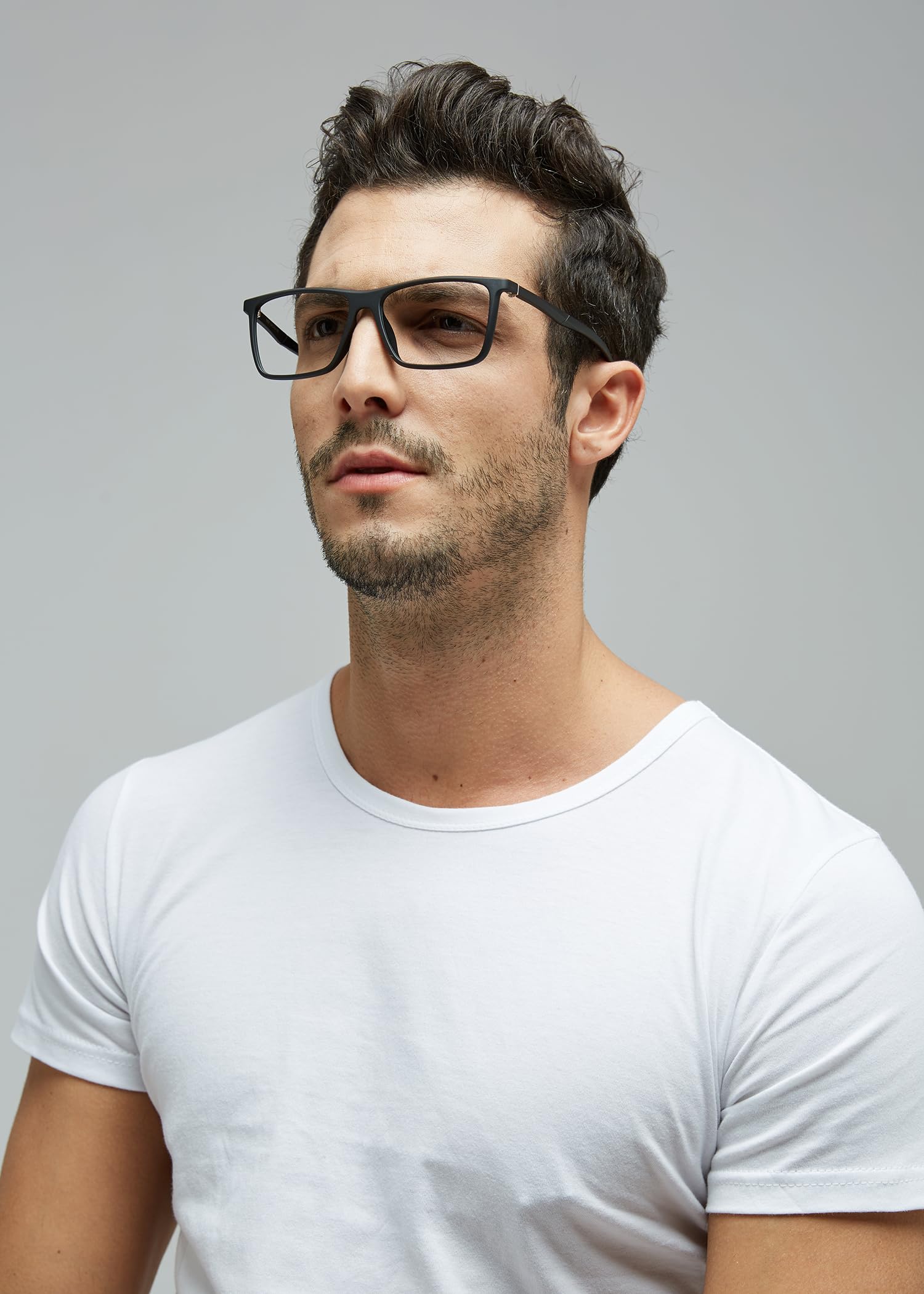 GUDVUE model wearing glasses at a laptop suggests practical daily use
